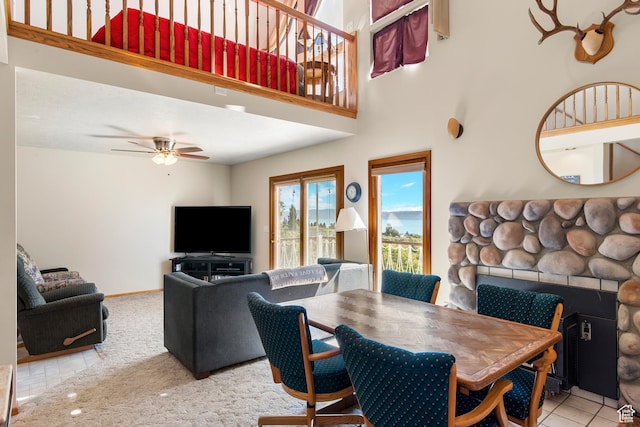 27 Lake W Cir, Fish Haven, ID 83287 - dining room featuring a fireplace and ceiling fan