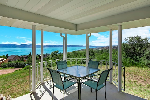27 Lake W Cir, Fish Haven, ID 83287 - sunroom featuring a water view and outdoor dining area
