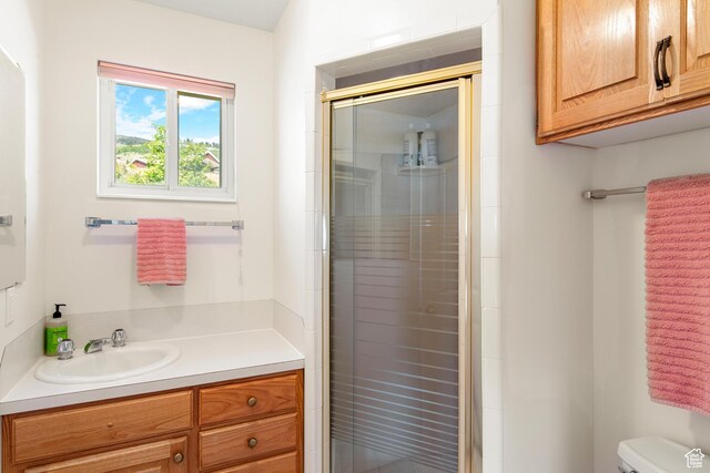 27 Lake W Cir, Fish Haven, ID 83287 - full bath featuring a stall shower, toilet, and vanity