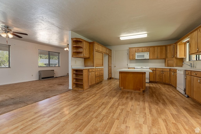 437 S 100 W, Kanab, UT 84741 - kitchen featuring white appliances, open shelves, open floor plan, light wood finished floors, and a textured ceiling