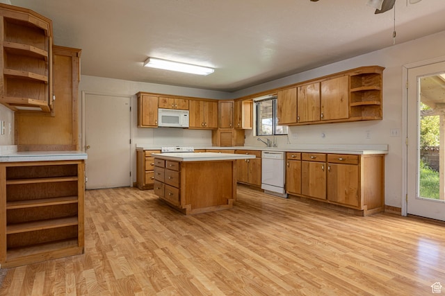 437 S 100 W, Kanab, UT 84741 - kitchen featuring open shelves, white appliances, light wood-style floors, and brown cabinets