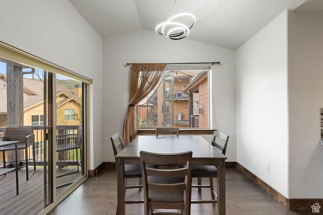 14311 N Buck Horn Trl Unit 42N, Kamas, UT 84036 - dining room featuring dark wood-style flooring, vaulted ceiling, and baseboards