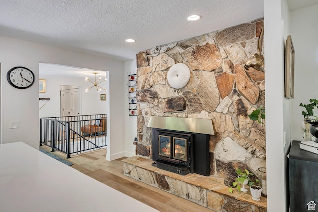 2634 S Cave Hollow Way, Bountiful, UT 84010 - living area featuring wood finished floors, a textured ceiling, recessed lighting, and a chandelier