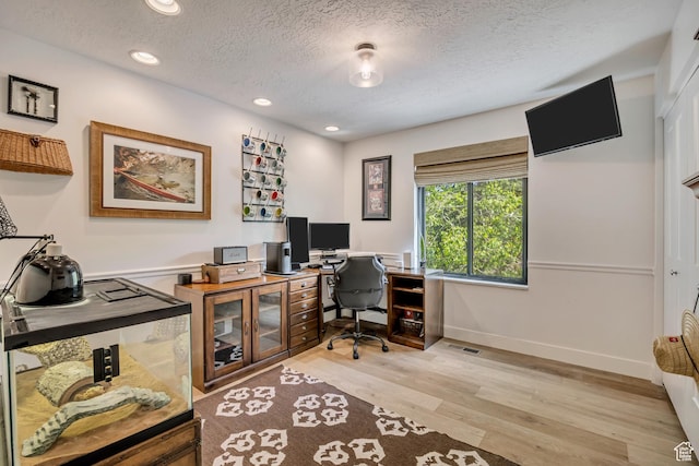 2634 S Cave Hollow Way, Bountiful, UT 84010 - office space with light wood-type flooring, recessed lighting, baseboards, and a textured ceiling