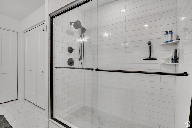 2634 S Cave Hollow Way, Bountiful, UT 84010 - bathroom featuring a shower stall, tile patterned floors, and a closet