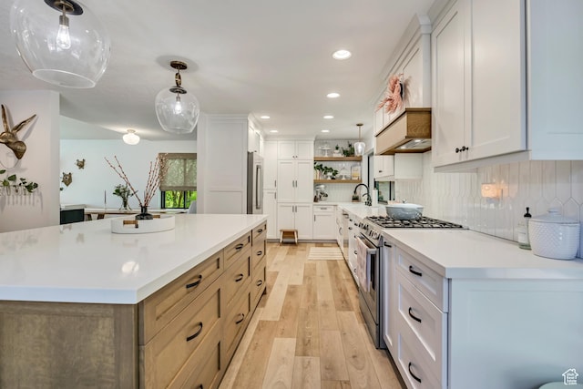 2634 S Cave Hollow Way, Bountiful, UT 84010 - kitchen with gas range, open shelves, light wood-style flooring, light countertops, and recessed lighting