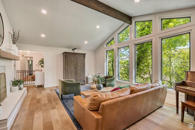 2634 S Cave Hollow Way, Bountiful, UT 84010 - living room with beamed ceiling, light wood finished floors, healthy amount of natural light, recessed lighting, and baseboards