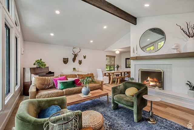 2634 S Cave Hollow Way, Bountiful, UT 84010 - living area with beamed ceiling, wood finished floors, recessed lighting, a tile fireplace, and healthy amount of natural light