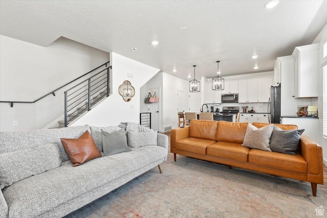 4376 W Bromwell Ct, Lehi, UT 84043 - living room with recessed lighting and stairs