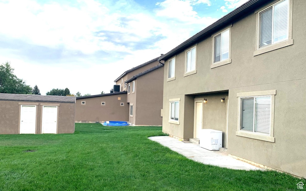 672 N 100 W, Vernal, UT 84078 - view of grassy yard with an outbuilding