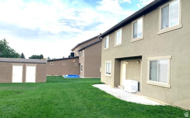 672 N 100 W, Vernal, UT 84078 - view of grassy yard with an outbuilding