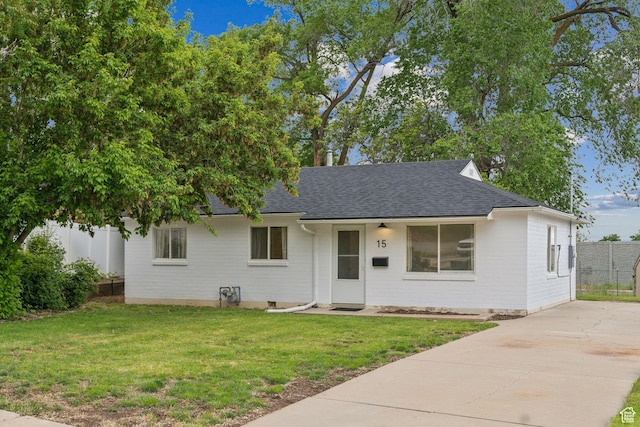 15 Airlane Dr, Clearfield, UT 84015 - view of front of house with roof with shingles, concrete driveway, and brick siding