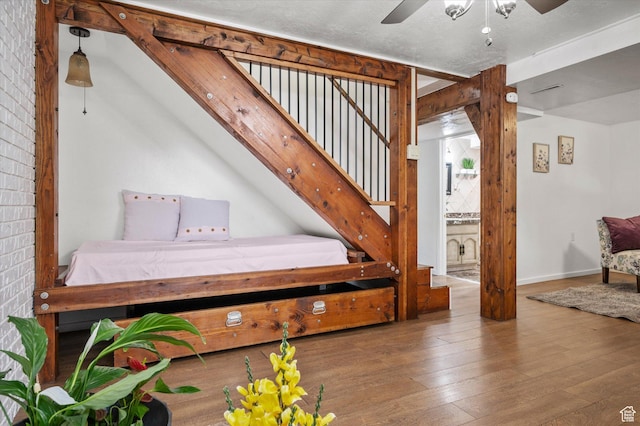 430 W 550 N, Logan, UT 84321 - stairs with ceiling fan, hardwood / wood-style flooring, and baseboards