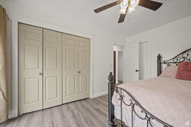 430 W 550 N, Logan, UT 84321 - bedroom with light wood-style flooring, a ceiling fan, a closet, and baseboards