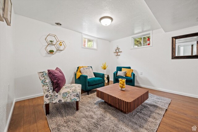 430 W 550 N, Logan, UT 84321 - sitting room with wood finished floors, baseboards, and a textured ceiling
