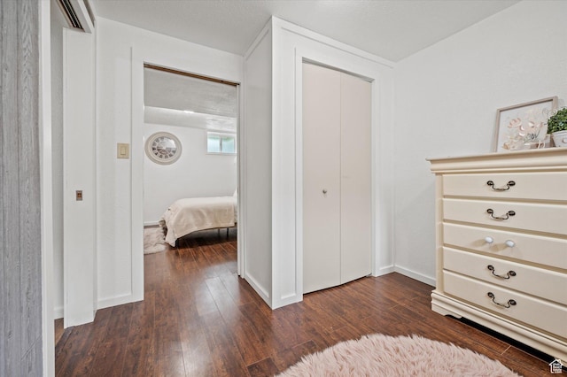 430 W 550 N, Logan, UT 84321 - bedroom with dark wood-style floors, a closet, and baseboards