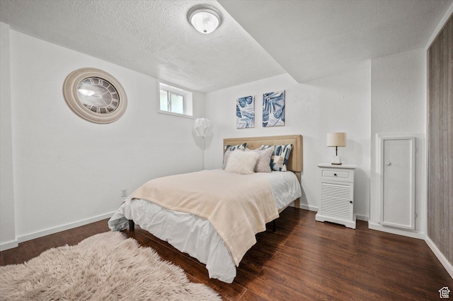 430 W 550 N, Logan, UT 84321 - bedroom featuring baseboards, wood finished floors, and a textured ceiling