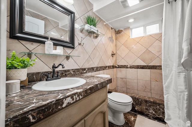 430 W 550 N, Logan, UT 84321 - bathroom with a tile shower, vanity, toilet, and marble finish floors