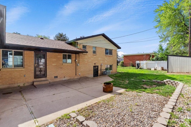 5680 S 2600 W Unit 12, Roy, UT 84067 - back of property with brick siding, a patio, roof with shingles, and cooling unit