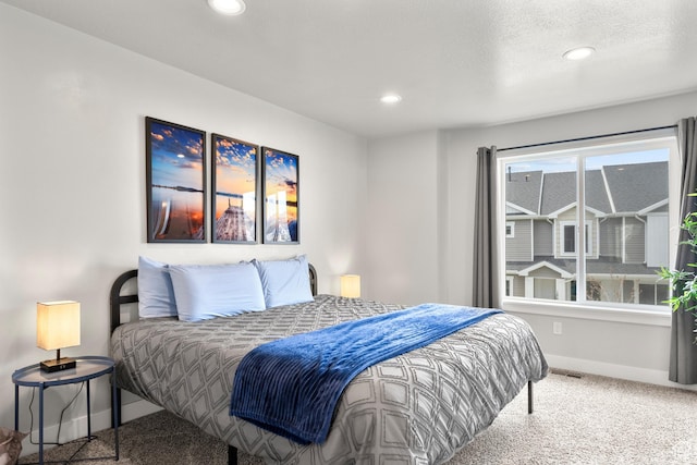 150 W Seasons Loop Unit 3, Garden City, UT 84028 - bedroom with baseboards, recessed lighting, and carpet floors