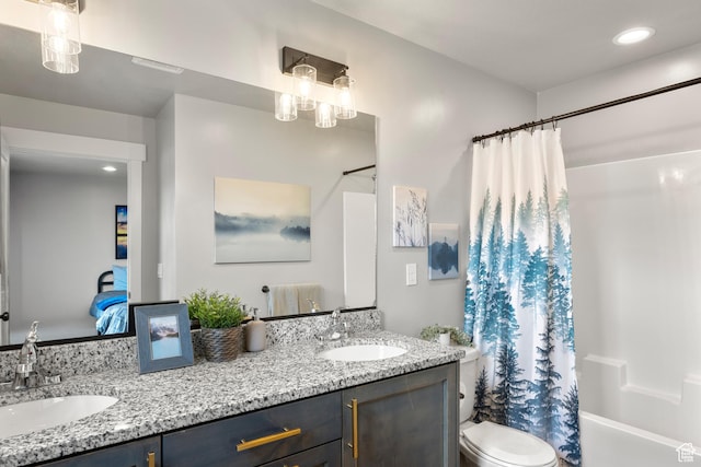 150 W Seasons Loop Unit 3, Garden City, UT 84028 - bathroom with double vanity, toilet, shower / bath combo, and recessed lighting