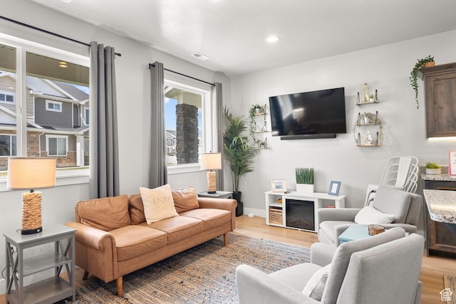 150 W Seasons Loop Unit 3, Garden City, UT 84028 - living area featuring light wood-type flooring and recessed lighting