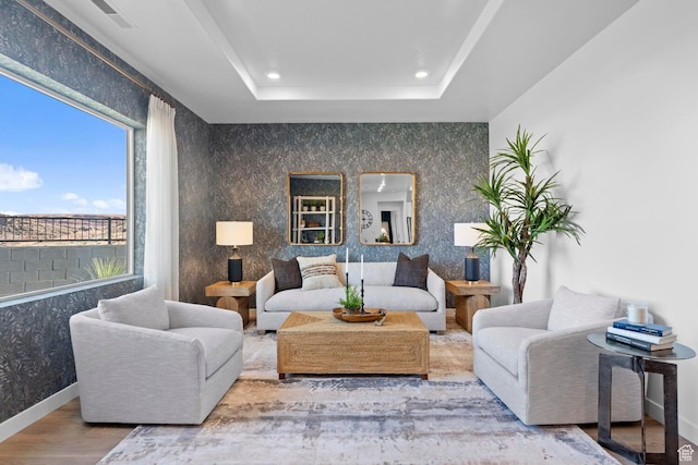 3719 E Padre Cv Unit 4092, Washington, UT 84780 - living room featuring wood finished floors, baseboards, recessed lighting, and a raised ceiling