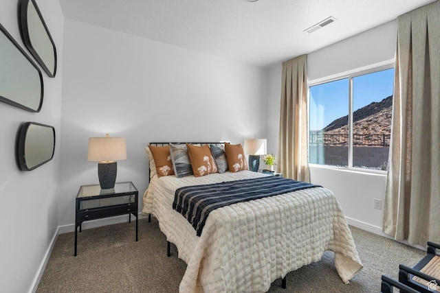 3719 E Padre Cv Unit 4092, Washington, UT 84780 - bedroom featuring carpet flooring, baseboards, and a mountain view