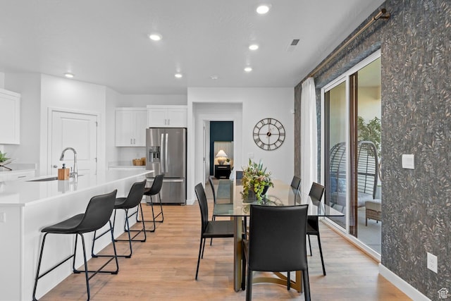 3719 E Padre Cv Unit 4092, Washington, UT 84780 - dining room featuring recessed lighting, light wood-style floors, and baseboards