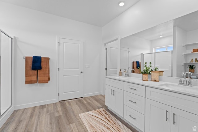 3719 E Padre Cv Unit 4092, Washington, UT 84780 - full bathroom featuring wood finished floors, a stall shower, double vanity, baseboards, and recessed lighting