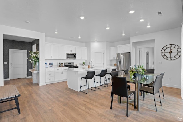3719 E Padre Cv Unit 4092, Washington, UT 84780 - dining space featuring baseboards, light wood-style flooring, and recessed lighting