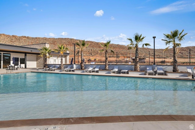 3719 E Padre Cv Unit 4092, Washington, UT 84780 - community pool with a patio area and a mountain view
