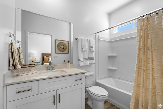 3719 E Padre Cv Unit 4092, Washington, UT 84780 - full bath featuring shower / bath combo, vanity, toilet, and wood finished floors