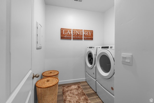 3719 E Padre Cv Unit 4092, Washington, UT 84780 - laundry area with washer and clothes dryer, dark wood-type flooring, and baseboards