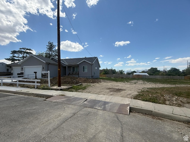 268 S 400 W, Tooele, UT 84074 - ranch-style home featuring concrete driveway and a garage