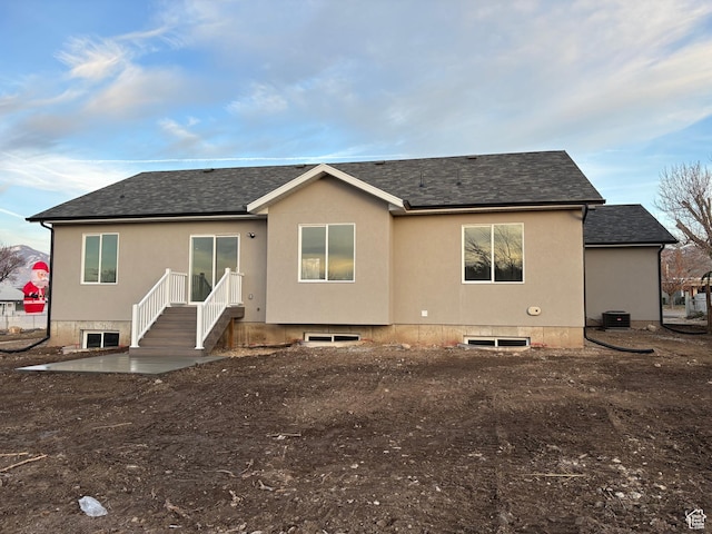 268 S 400 W, Tooele, UT 84074 - rear view of house featuring roof with shingles and central AC