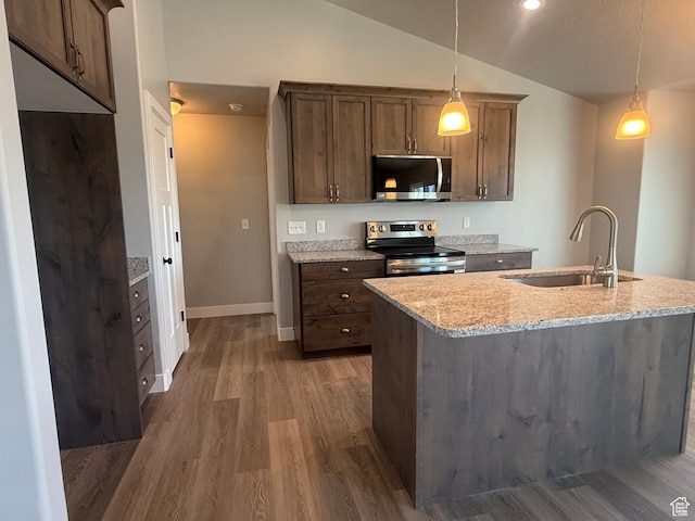 268 S 400 W, Tooele, UT 84074 - kitchen with appliances with stainless steel finishes, a sink, lofted ceiling, wood finished floors, and pendant lighting