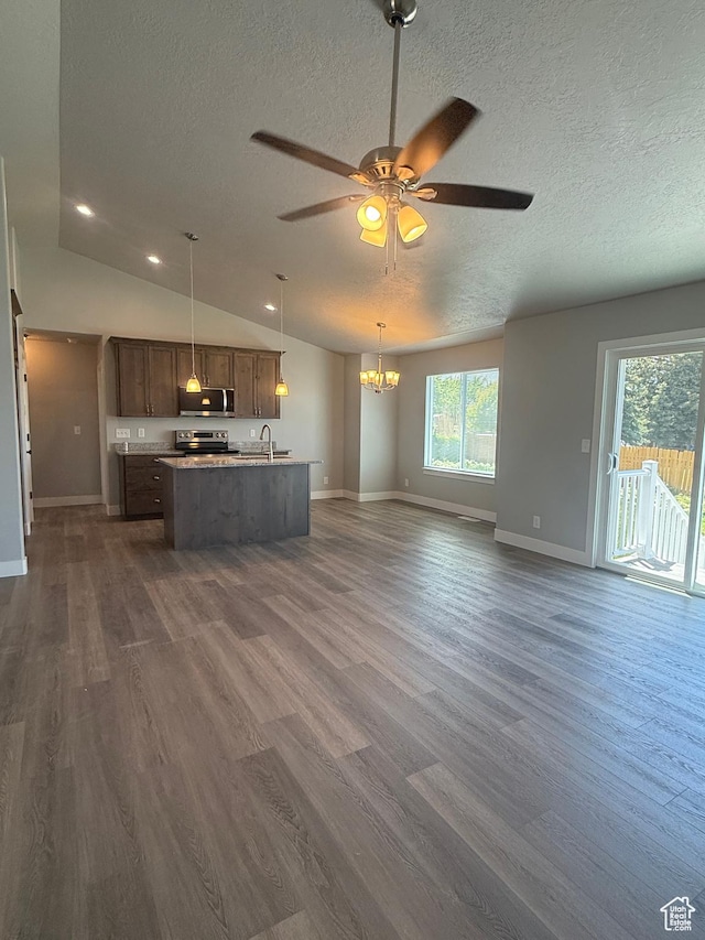 268 S 400 W, Tooele, UT 84074 - kitchen featuring appliances with stainless steel finishes, a textured ceiling, open floor plan, a ceiling fan, and a chandelier