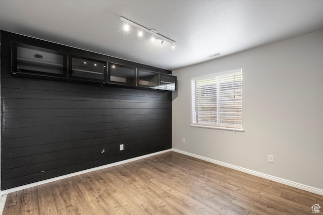 714 N 300 W, American Fork, UT 84003 - empty room with track lighting, light wood finished floors, and baseboards