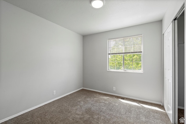 714 N 300 W, American Fork, UT 84003 - unfurnished bedroom featuring carpet flooring, a closet, and baseboards