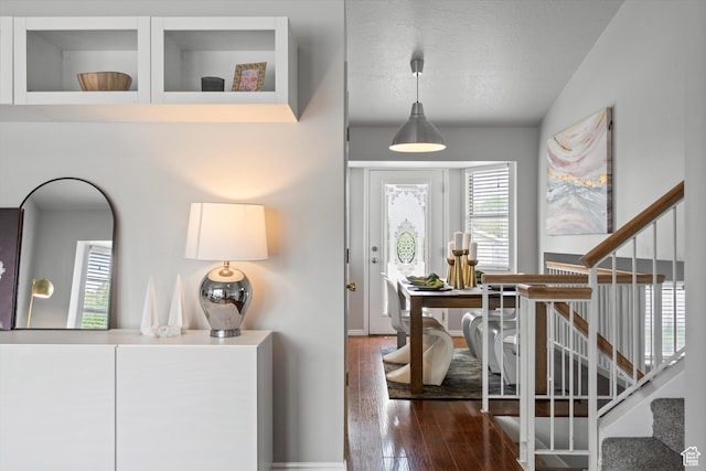 714 N 300 W, American Fork, UT 84003 - entryway featuring stairs, dark wood-style floors, healthy amount of natural light, vaulted ceiling, and a textured ceiling