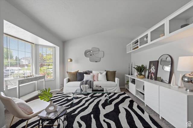 714 N 300 W, American Fork, UT 84003 - living room featuring carpet flooring, vaulted ceiling, and baseboards