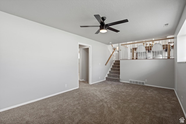 714 N 300 W, American Fork, UT 84003 - unfurnished room featuring a ceiling fan, carpet flooring, stairs, baseboards, and a textured ceiling