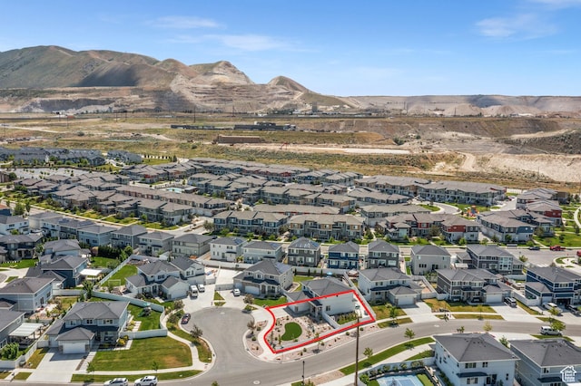 1067 W Ludington Ct, Bluffdale, UT 84065 - aerial view of residential area featuring property parcel outlined and a mountain backdrop