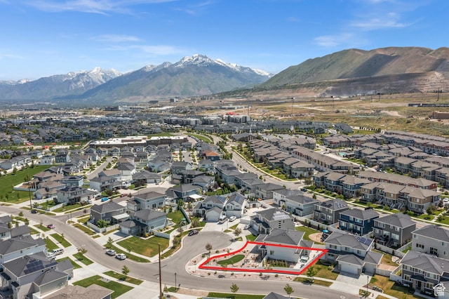 1067 W Ludington Ct, Bluffdale, UT 84065 - aerial view of property's location with a mountainous background, nearby suburban area, and property boundaries highlighted