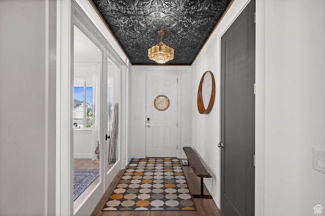 1067 W Ludington Ct, Bluffdale, UT 84065 - entryway featuring baseboards, a chandelier, and an ornate ceiling