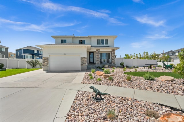 1067 W Ludington Ct, Bluffdale, UT 84065 - prairie-style home featuring stone siding, concrete driveway, and an attached garage