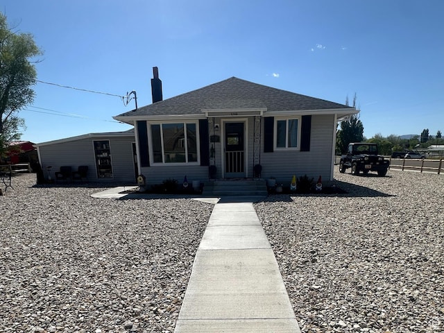 110 S 200 E, Cleveland, UT 84518 - bungalow-style house featuring roof with shingles and a chimney