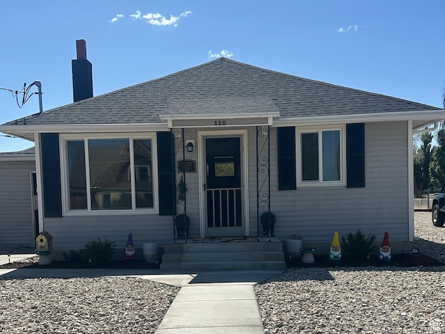 110 S 200 E, Cleveland, UT 84518 - bungalow-style house featuring a shingled roof and a chimney