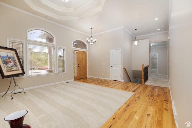 14825 S Meadow Oak Ct, Draper, UT 84020 - foyer entrance featuring crown molding, wood finished floors, baseboards, a chandelier, and recessed lighting